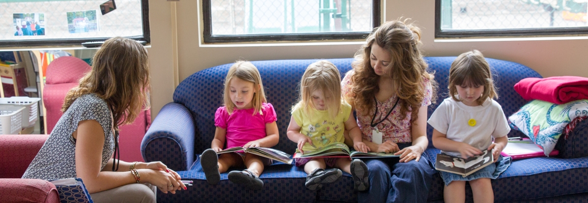 Clinical educators and children reading books